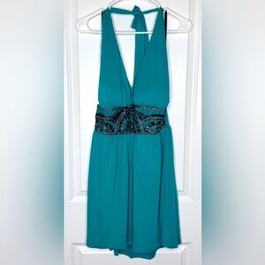 Like new 2b Bebe  green dress with embellishments